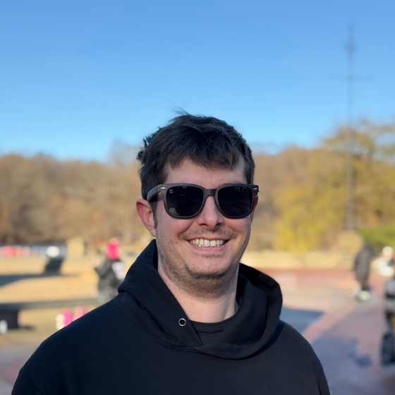 guy wearing premium dark wooden sunglasses with large black lenses in new york