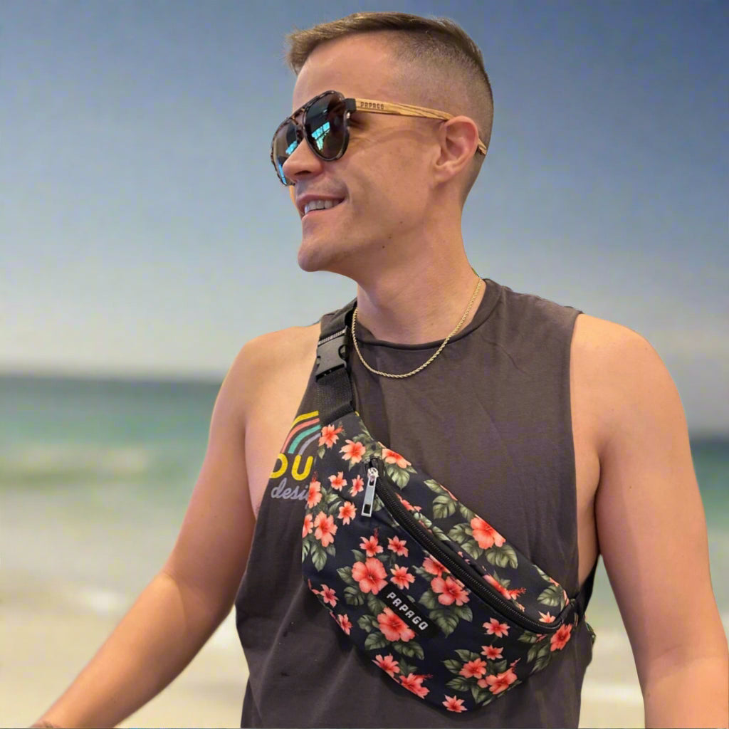 guy wearing floral explorers belt bag and premium sustainable wooden sunglasses